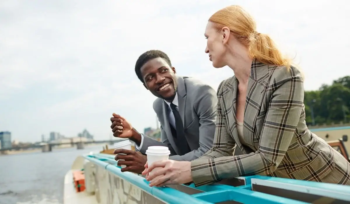 Two people discussing next steps for boat prep on boat deck
